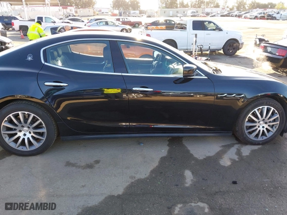 2014 Maserati Ghibli S Q4 with VIN ZAM57RTA2E1086046, listed as a IAAI auction lot 41846389 with 55,984 mi miles. Bid and sale history available at carsss.com. Image 13.