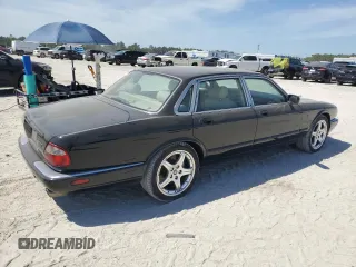 2003 Jaguar XJ with VIN SAJDA15B83MF58887, listed as a Copart auction lot 51057895 with 189,770 mi miles and Clean title. Bid and sale history available at DreamBid. Image 3.