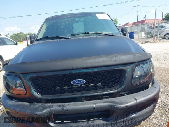1998 Ford F-150 with VIN 1FTRX18L2WKA67414, listed as a IAAI auction lot 42583873 with 189,546 mi miles and . Bid and sale history available at DreamBid. Image 6.