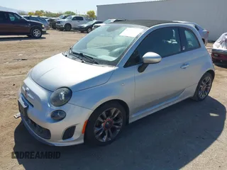 2014 FIAT 500 Abarth with VIN 3C3CFFJH8ET188400, listed as a IAAI auction lot 42014197 with 86,869 mi miles. Bid and sale history available at carsss.com. Image 2.