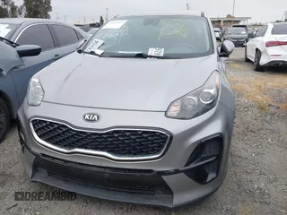 2021 Kia Sportage LX with VIN KNDPM3AC2M7931660, listed as a IAAI auction lot 41924609 with 55,512 mi miles. Bid and sale history available at carsss.com. Image 13.