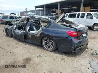 2017 BMW 7 Series 750i with VIN WBA7F0C34HGM21898, listed as a IAAI auction lot 39554484 with Not Provided miles and . Bid and sale history available at carsss.com. Image 3.