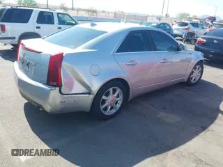 2009 Cadillac CTS RWD z VIN 1G6DU57VX90143820, wystawiony jako IAAI lot #42450086 z przebiegiem 170 656 mil mil oraz . Historia ofert i sprzedaży dostępna na DreamBid. Obrazek 4.