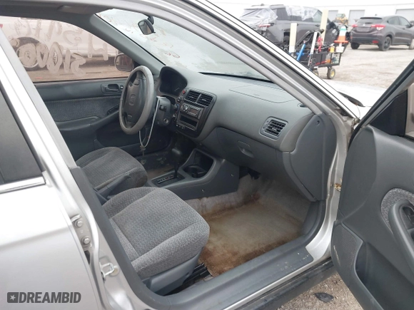 1999 Honda Civic EX with VIN 1HGEJ8649XL023282, listed as a IAAI auction lot 41496406 with 229,003 mi miles. Bid and sale history available at carsss.com. Image 5.
