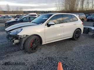 2014 Porsche Cayenne GTS z VIN WP1AD2A21ELA78053, wystawiony jako Copart lot #87922985 z przebiegiem 80 046 mil mil oraz Szkoda całkowita • Salvage title. Historia ofert i sprzedaży dostępna na DreamBid. Obrazek 1.