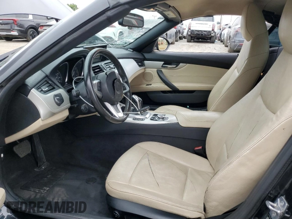 2012 BMW Z4 sDrive28i with VIN WBALL5C56CE716558, listed as a Copart auction lot 62003125 with 93,438 mi miles and Salvage title. Bid and sale history available at DreamBid. Image 7.