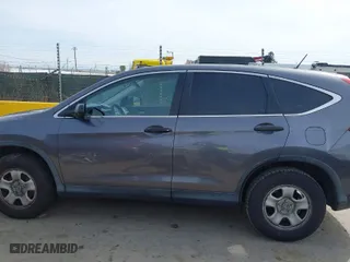 2015 Honda CR-V LX with VIN 3CZRM3H32FG702573, listed as a IAAI auction lot 41824116 with 266,847 mi miles. Bid and sale history available at carsss.com. Image 14.