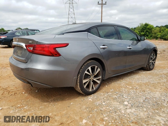 2016 Nissan Maxima S с VIN 1N4AA6AP4GC378207, выставлен на аукционе Copart как лот 58062195 с пробегом 107 167 миль миль и Списание • Salvage title. История ставок и продаж доступна на DreamBid. Изображение 3.