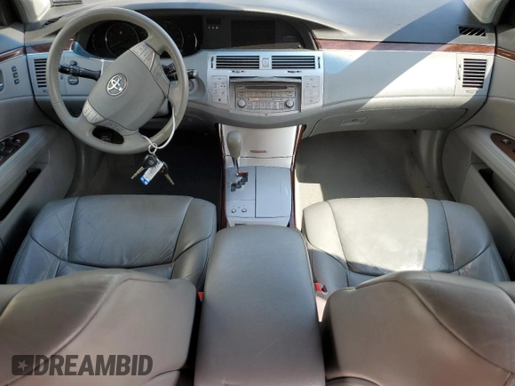 2010 Toyota Avalon XL with VIN 4T1BK3DB3AU357047, listed as a Copart auction lot 52694255 with 130,749 mi miles and Salvage Title. Bid and sale history available at carsss.com. Image 8.
