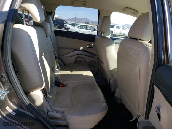 2010 Mitsubishi Outlander XLS with VIN JA4JT4AX8AZ006392, listed as a Copart auction lot 50663555 with 104,172 mi miles and Salvage Title. Bid and sale history available at carsss.com. Image 11.