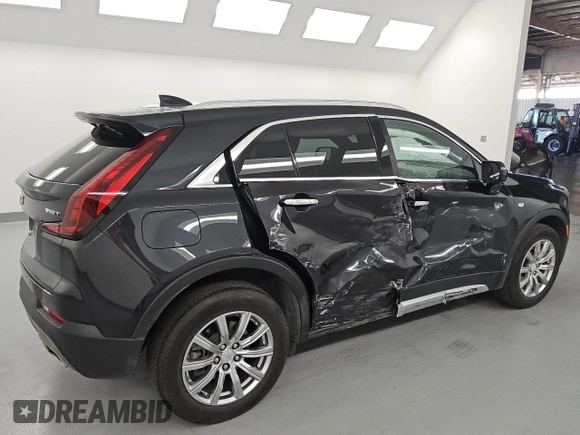 2023 Cadillac XT4 AWD Premium Luxury z VIN 1GYFZDR42PF174473, wystawiony jako Copart lot #55953305 z przebiegiem 42 268 mil mil oraz Szkoda całkowita • Salvage title. Historia ofert i sprzedaży dostępna na DreamBid. Obrazek 3.