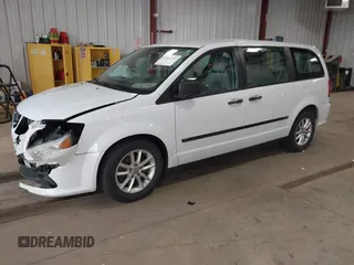 2014 Dodge Grand Caravan American Value with VIN 2C4RDGBG7ER345277, listed as a IAAI auction lot 42061355 with 145,889 mi miles and . Bid and sale history available at DreamBid. Image 17.