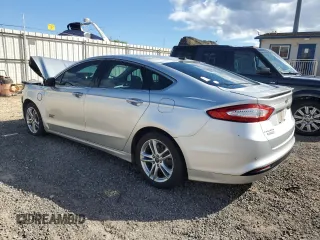 2016 Ford Fusion Titanium with VIN 3FA6P0SU1GR316318, listed as a Copart auction lot 56244015 with 73,451 mi miles and Salvage title. Bid and sale history available at DreamBid. Image 2.