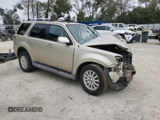2011 Mercury Mariner Premier с VIN 4M2CN8H74BKJ04765, выставлен на аукционе Copart как лот 45813985 с пробегом Не указан миль и Списание • Salvage title. История ставок и продаж доступна на DreamBid. Изображение 4.