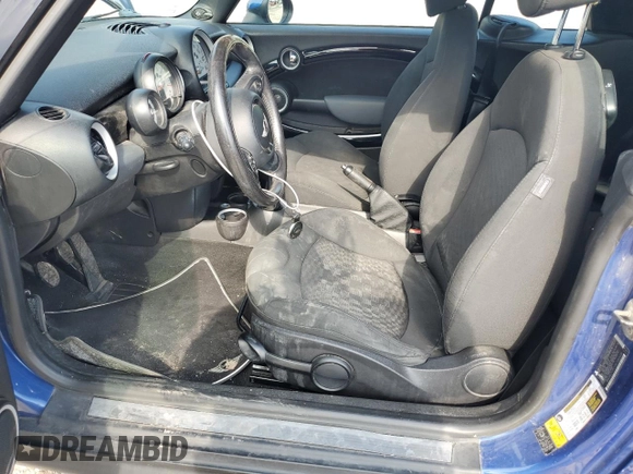 2012 MINI Convertible с VIN WMWZN3C53CT265318, выставлен на аукционе Copart как лот 56195735 с пробегом 120 972 миль миль и Списание • Salvage title. История ставок и продаж доступна на DreamBid. Изображение 7.