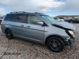 2005 Honda Odyssey Touring z VIN 5FNRL38855B051447, wystawiony jako Copart lot #57144925 z przebiegiem 186 476 mil mil oraz Szkoda całkowita • Salvage title. Historia ofert i sprzedaży dostępna na DreamBid. Obrazek 4.