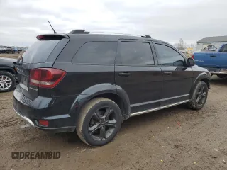 2018 Dodge Journey Crossroad with VIN 3C4PDDGGXJT387514, listed as a Copart auction lot 50145295 with 128,625 mi miles and Clean Title. Bid and sale history available at DreamBid. Image 3.