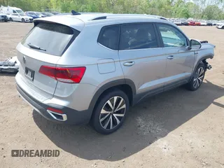 2023 Volkswagen Taos SE z VIN 3VVEX7B24PM342309, wystawiony jako IAAI lot #42138958 z przebiegiem 18 787 mil mil oraz . Historia ofert i sprzedaży dostępna na DreamBid. Obrazek 4.
