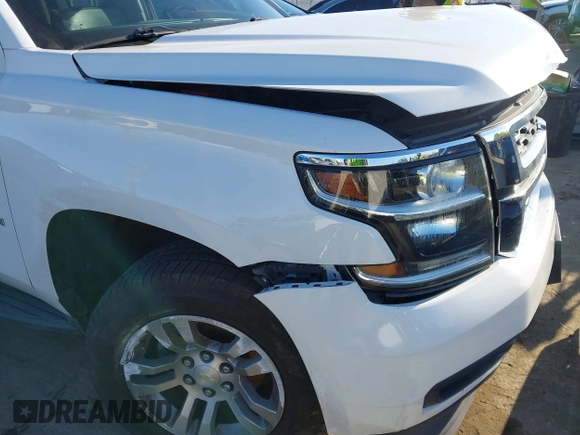2015 Chevrolet Suburban LT with VIN 1GNSCJKC2FR680413, listed as a IAAI auction lot 41634666 with 127,175 mi miles and . Bid and sale history available at DreamBid. Image 18.