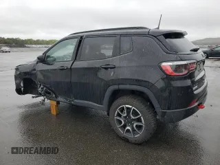 2024 Jeep Compass Trailhawk with VIN 3C4NJDDN6RT104623, listed as a Copart auction lot 57217045 with 15,306 mi miles and Salvage title. Bid and sale history available at DreamBid. Image 2.