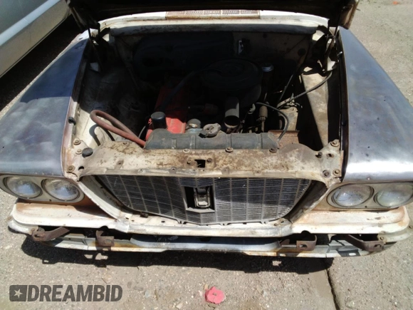 1960 Plymouth Valiant z VIN 1307117456, wystawiony jako Copart lot #48976045 z przebiegiem 20 241 mil mil oraz Czysty tytuł • Clean title. Historia ofert i sprzedaży dostępna na DreamBid. Obrazek 11.