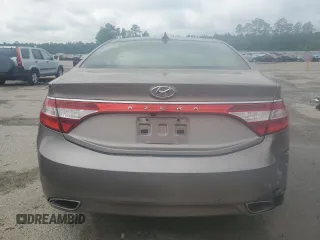 2013 Hyundai Azera z VIN KMHFH4JG1DA285969, wystawiony jako Copart lot #51234205 z przebiegiem 64 342 mil mil oraz Czysty tytuł • Clean title. Historia ofert i sprzedaży dostępna na DreamBid. Obrazek 6.