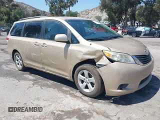 2012 Toyota Sienna LE AAS with VIN 5TDKK3DC5CS186077, listed as a IAAI auction lot 40265988 with 130,888 mi miles and . Bid and sale history available at DreamBid. Image 1.
