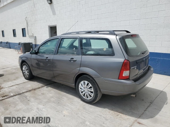 2006 Ford Focus SE with VIN 1FAHP36N56W223049, listed as a Copart auction lot 61211745 with 185,609 mi miles and Salvage title. Bid and sale history available at DreamBid. Image 2.