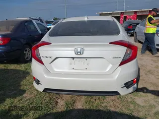 2018 Honda Civic EX with VIN 19XFC2F7XJE039026, listed as a IAAI auction lot 41963886 with 71,011 mi miles and . Bid and sale history available at DreamBid. Image 17.