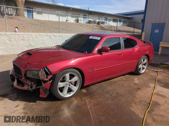 2006 Dodge Charger SRT-8 with VIN 2B3LA73W56H369414, listed as a Copart auction lot 49818765 with 117,563 mi miles and Salvage Title. Bid and sale history available at DreamBid. Image 1.