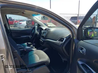 2013 Dodge Journey SXT with VIN 3C4PDCBB4DT563709, listed as a IAAI auction lot 42019033 with 201,188 mi miles. Bid and sale history available at carsss.com. Image 5.