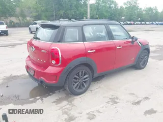 2014 MINI Countryman S z VIN WMWZC5C50EWP39566, wystawiony jako IAAI lot #42456424 z przebiegiem 99 518 mil mil oraz . Historia ofert i sprzedaży dostępna na DreamBid. Obrazek 4.