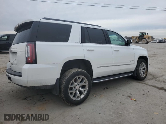 2019 GMC Yukon SLE with VIN 1GKS2AKC0KR275077, listed as a Copart auction lot 84231604 with 93,907 mi miles and Salvage Title. Bid and sale history available at carsss.com. Image 3.