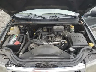 2002 Jeep Grand Cherokee z VIN 1J4GX38S72C152046, wystawiony jako Copart lot #57963095 z przebiegiem 204 576 mil mil oraz Szkoda całkowita • Salvage title. Historia ofert i sprzedaży dostępna na DreamBid. Obrazek 12.