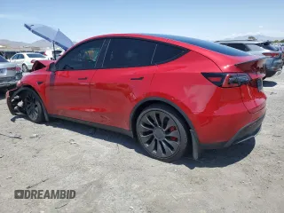 2022 Tesla Model Y Performance z VIN 7SAYGDEF9NF510183, wystawiony jako Copart lot #61263405 z przebiegiem 19 411 mil mil oraz Szkoda całkowita • Salvage title. Historia ofert i sprzedaży dostępna na DreamBid. Obrazek 2.
