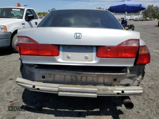 1999 Honda Accord LX z VIN JHMCG5549XC040487, wystawiony jako Copart lot #67415984 z przebiegiem 205 698 mil mil oraz Szkoda całkowita • Salvage title. Historia ofert i sprzedaży dostępna na DreamBid. Obrazek 6.