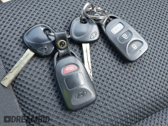 2009 Hyundai Elantra Touring with VIN KMHDC86E99U035163, listed as a IAAI auction lot 42049897 with 123,559 mi miles and . Bid and sale history available at DreamBid. Image 11.