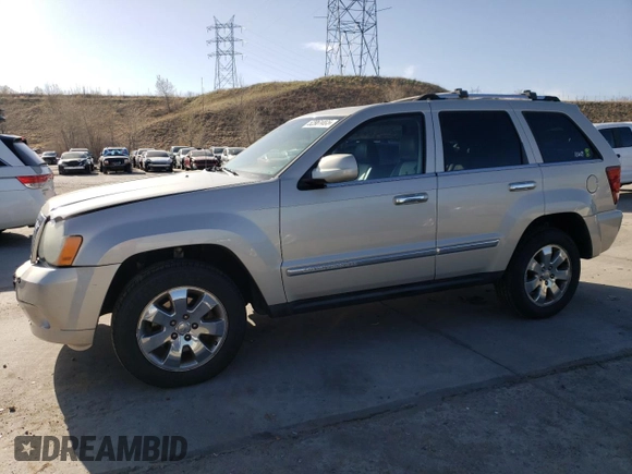 2010 Jeep Grand Cherokee Limited with VIN 1J4RR5GT3AC135686, listed as a Copart auction lot 52961465 with 136,034 mi miles and Salvage title. Bid and sale history available at DreamBid. Image 1.