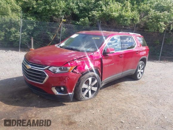 2018 Chevrolet Traverse LT z VIN 1GNEVHKW6JJ184290, wystawiony jako IAAI lot #42176919 z przebiegiem 103 835 mil mil oraz . Historia ofert i sprzedaży dostępna na DreamBid. Obrazek 2.