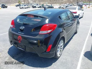 2013 Hyundai Veloster w/Gray Int with VIN KMHTC6AD2DU140750, listed as a IAAI auction lot 42615351 with 191,873 mi miles and . Bid and sale history available at DreamBid. Image 4.