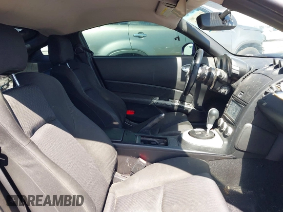 2006 Nissan 350Z Grand Touring with VIN JN1AZ34DX6M306717, listed as a IAAI auction lot 41762710 with 116,677 mi miles and . Bid and sale history available at DreamBid. Image 5.