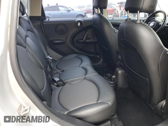 2015 MINI Countryman S z VIN WMWZC3C58FWT06471, wystawiony jako Copart lot #57570585 z przebiegiem 101 963 mil mil oraz Tytuł czysty. Historia ofert i sprzedaży dostępna na DreamBid. Obrazek 10.