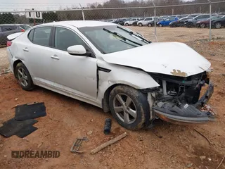 2015 Kia Optima LX with VIN KNAGM4A73F5646213, listed as a IAAI auction lot 41290553 with 101,415 mi miles. Bid and sale history available at carsss.com. Image 1.