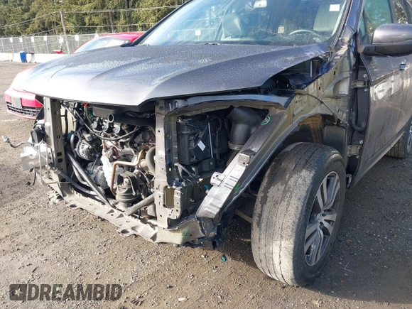 2017 Honda Pilot EX-L with VIN 5FNYF6H5XHB059834, listed as a IAAI auction lot 41670003 with 58,285 mi miles and . Bid and sale history available at DreamBid. Image 6.
