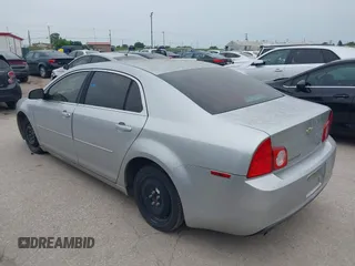 2010 Chevrolet Malibu 1LT with VIN 1G1ZC5E05AF117293, listed as a IAAI auction lot 42069310 with 164,477 mi miles and . Bid and sale history available at DreamBid. Image 3.