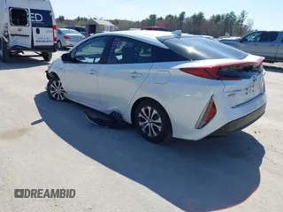 2021 Toyota Prius LE with VIN JTDKAMFP8M3174629, listed as a IAAI auction lot 42087974 with 16,348 mi miles and . Bid and sale history available at DreamBid. Image 3.