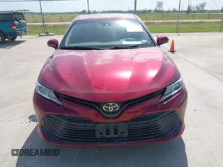 2020 Toyota Camry LE with VIN 4T1L11AK3LU993342, listed as a IAAI auction lot 42033420 with 84,849 mi miles and . Bid and sale history available at DreamBid. Image 12.
