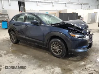 2020 Mazda CX-30 with VIN 3MVDMBBL0LM114783, listed as a Copart auction lot 50521185 with 48,769 mi miles and Salvage Title. Bid and sale history available at DreamBid. Image 4.