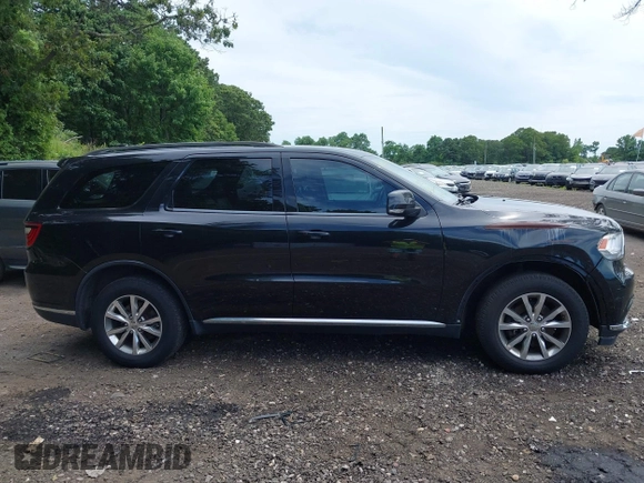 2015 Dodge Durango Limited z VIN 1C4RDJDG7FC244843, wystawiony jako IAAI lot #42730577 z przebiegiem 102 646 mil mil oraz . Historia ofert i sprzedaży dostępna na DreamBid. Obrazek 14.