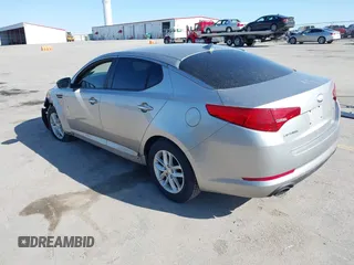2013 Kia Optima LX with VIN KNAGM4A73D5356339, listed as a IAAI auction lot 41979364 with 140,000 mi miles. Bid and sale history available at carsss.com. Image 3.